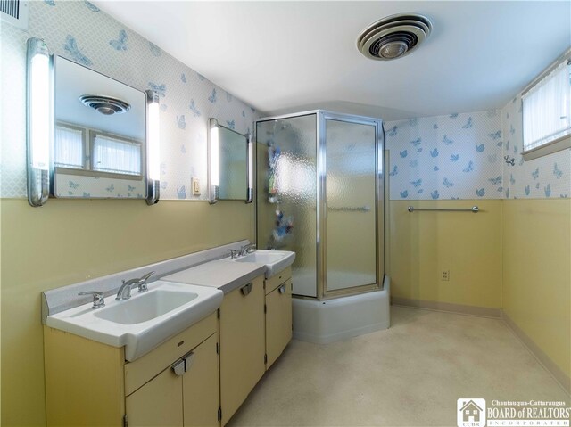 2 Elm Ln, Chautauqua, NY 14722 - bathroom with wallpapered walls, vanity, visible vents, and a shower with door