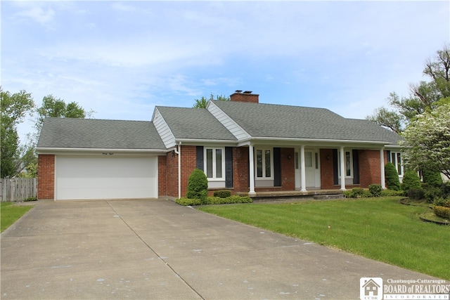 single story home with a garage and a front yard