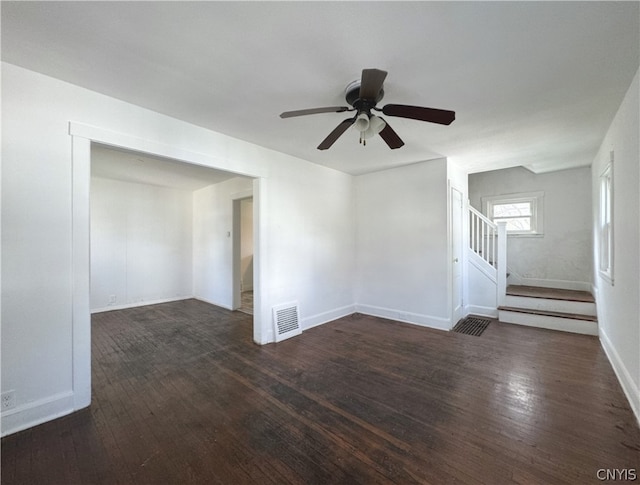 unfurnished room featuring dark hardwood / wood-style floors and ceiling fan