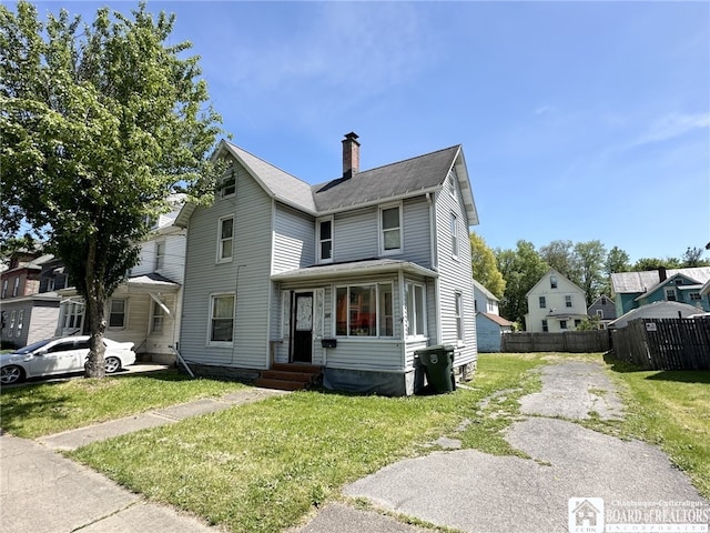 front of property with a front yard