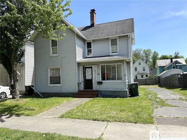 front of property featuring a front yard