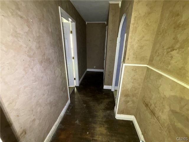 hallway with dark hardwood / wood-style floors