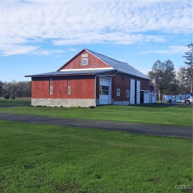 view of home's exterior featuring a lawn