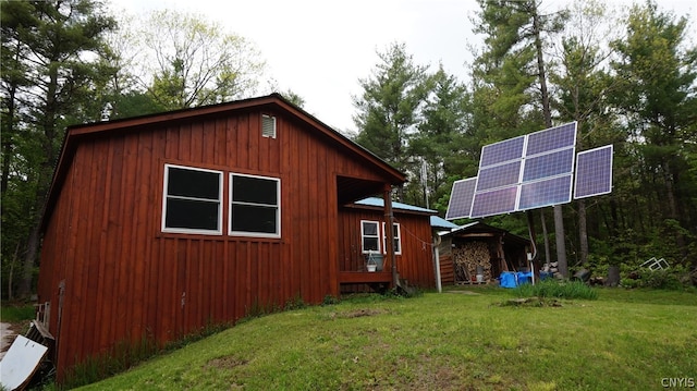 view of home's exterior featuring a yard