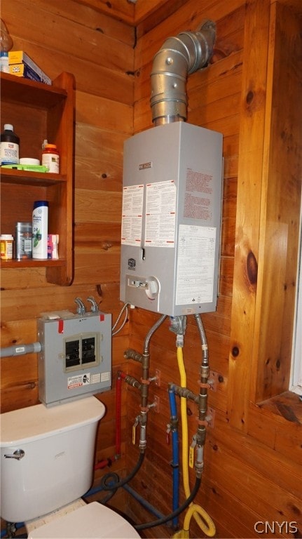 utility room featuring water heater