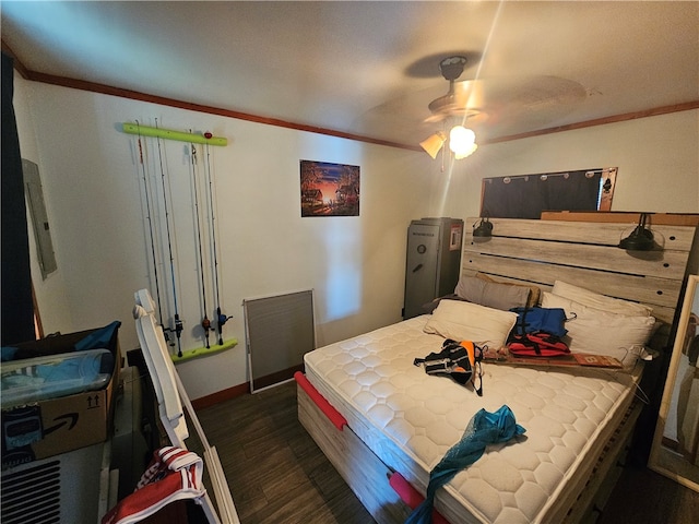 bedroom featuring ornamental molding, ceiling fan, and dark hardwood / wood-style floors