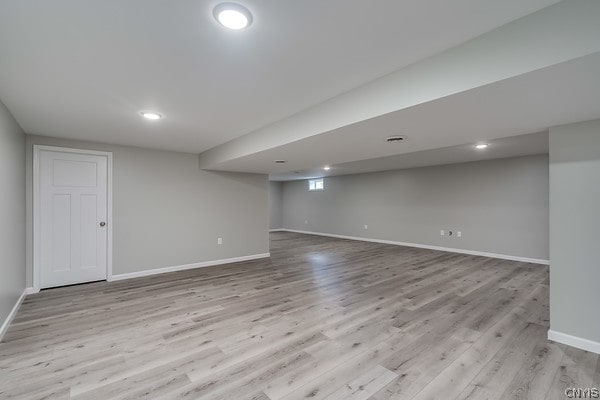 22217 Freedom Dr, Champion, NY 13619 - basement featuring light hardwood / wood-style flooring