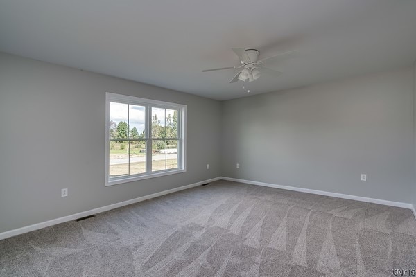 22217 Freedom Dr, Champion, NY 13619 - spare room with carpet flooring and ceiling fan