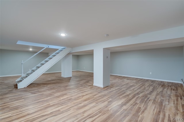 basement with light wood-type flooring