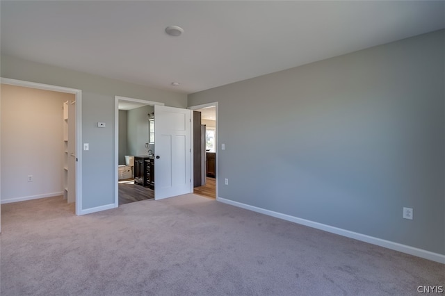 unfurnished bedroom featuring carpet flooring