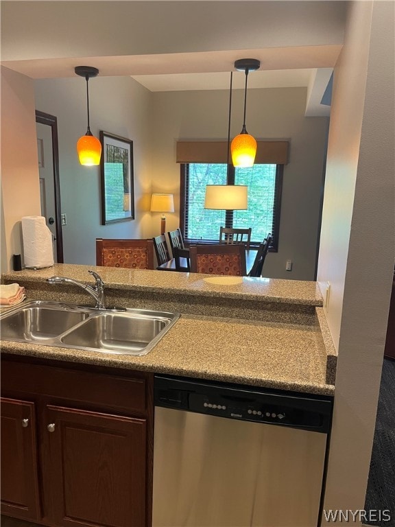 kitchen with dishwasher, sink, dark brown cabinets, and pendant lighting