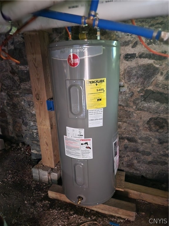 utility room featuring water heater