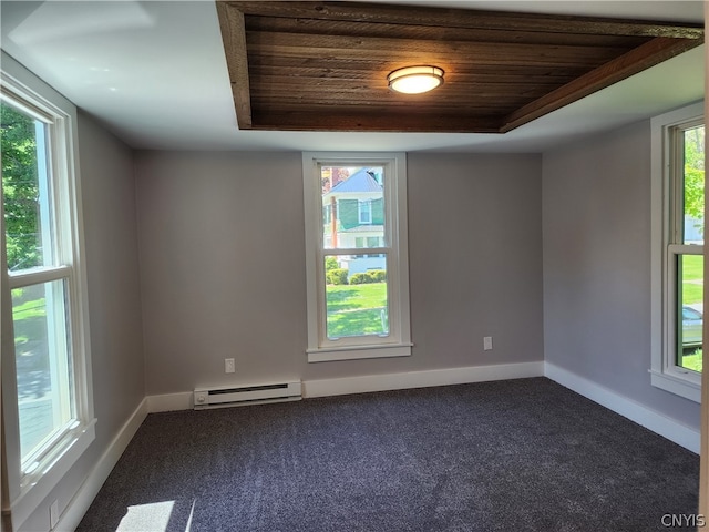 empty room with wooden ceiling and a healthy amount of sunlight