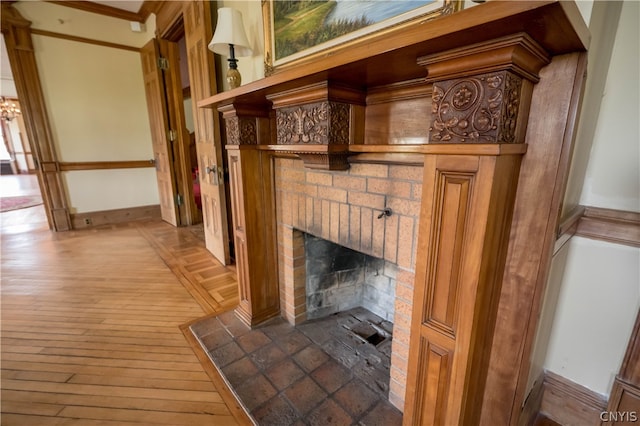 room details featuring wood-type flooring and a fireplace