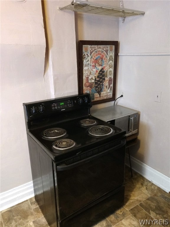 kitchen with black / electric stove