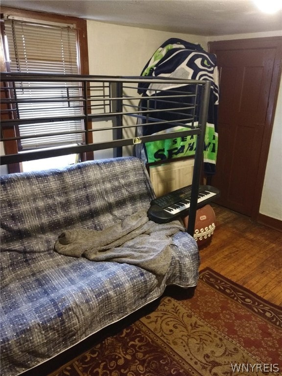 bedroom featuring hardwood / wood-style flooring