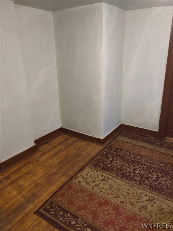 1510 Ashland Ave, Niagara Falls, NY 14301 - empty room with dark wood-style flooring and baseboards