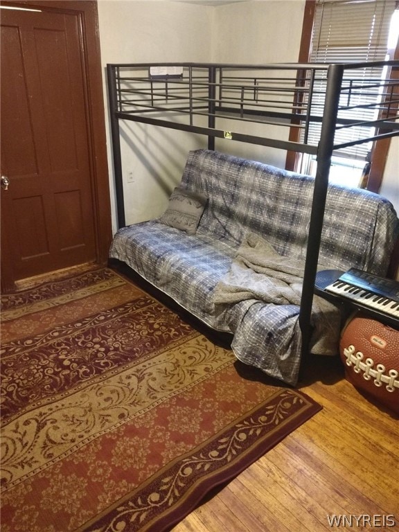 bedroom featuring hardwood / wood-style floors