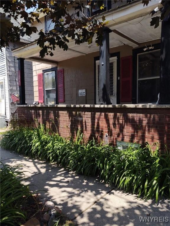 1510 Ashland Ave, Niagara Falls, NY 14301 - entrance to property featuring brick siding and covered porch