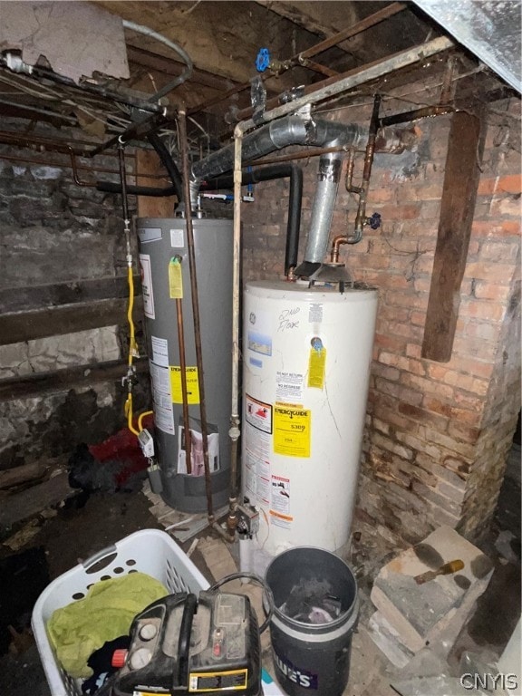 utility room featuring water heater