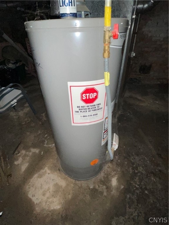 utility room featuring gas water heater