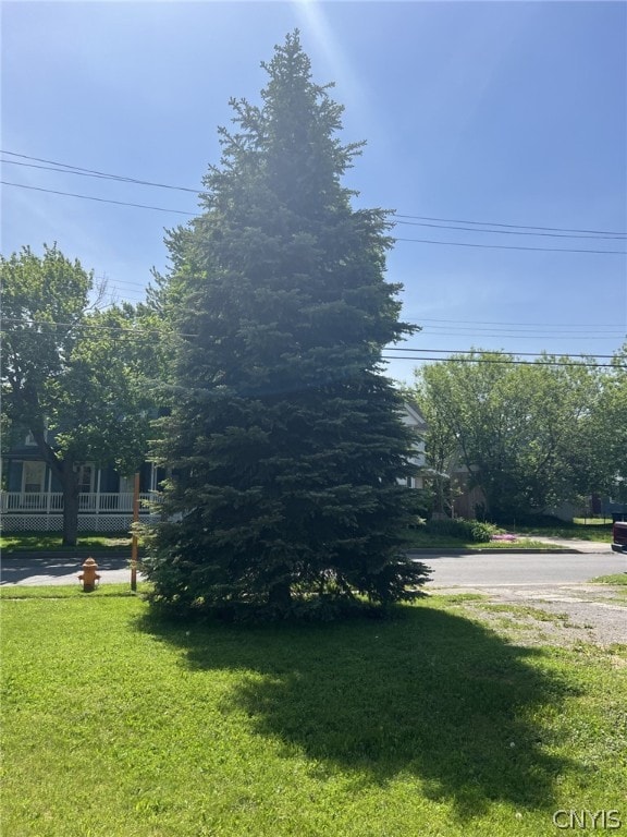 view of property exterior featuring a yard