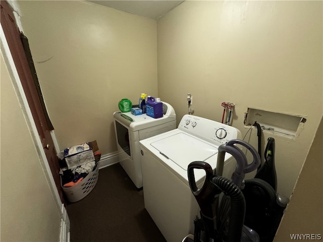 laundry area with separate washer and dryer and hookup for a washing machine