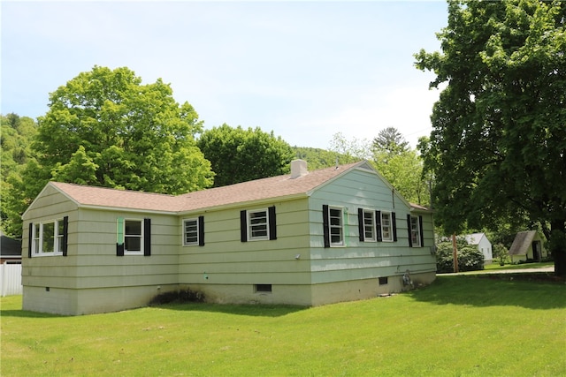 exterior space with a front lawn