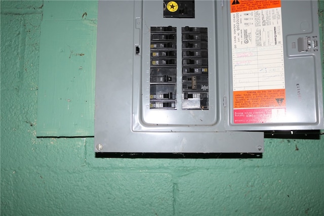 utility room featuring electric panel