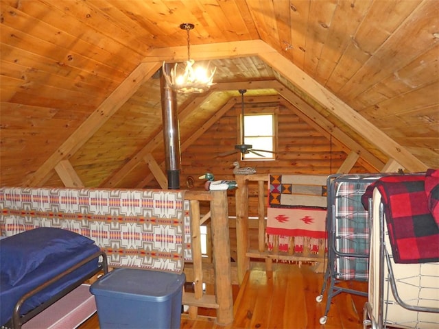 bedroom with wood-type flooring, lofted ceiling, rustic walls, and wooden ceiling