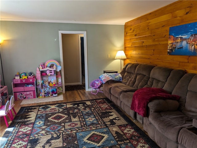 living room featuring dark hardwood / wood-style floors and ornamental molding