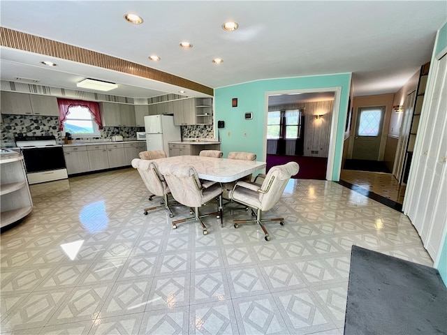 dining room with a wealth of natural light