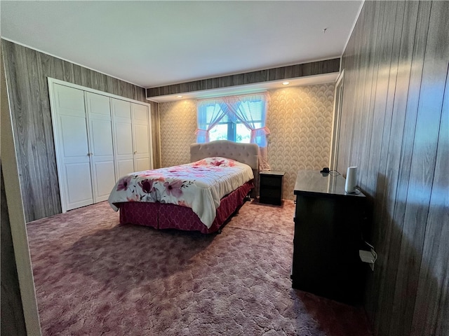 carpeted bedroom with a closet