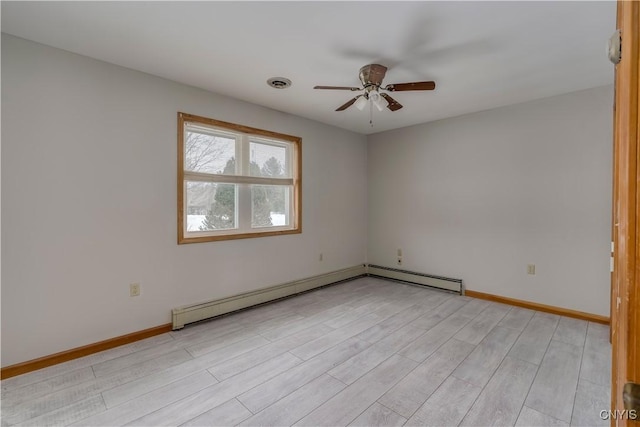 unfurnished room with baseboard heating, ceiling fan, and light hardwood / wood-style floors