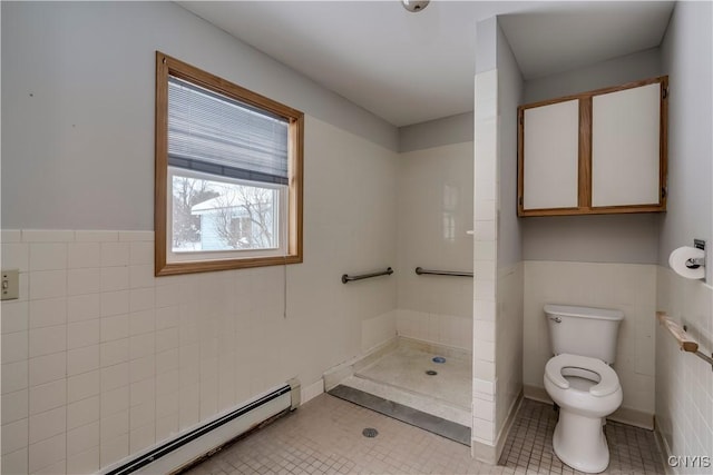 bathroom with tile walls, a baseboard heating unit, a tile shower, tile patterned floors, and toilet