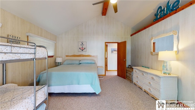 carpeted bedroom featuring lofted ceiling with beams and ceiling fan