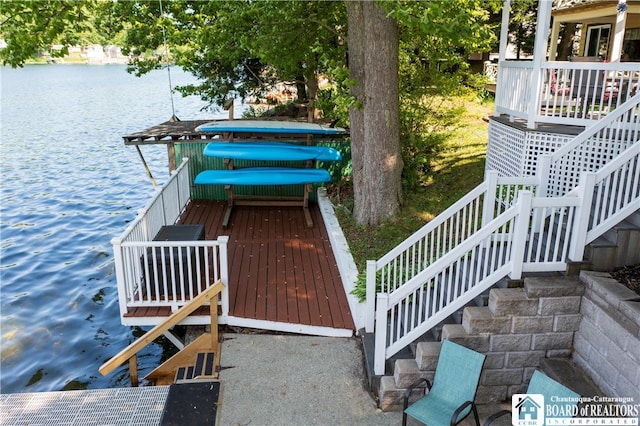 dock area with a water view