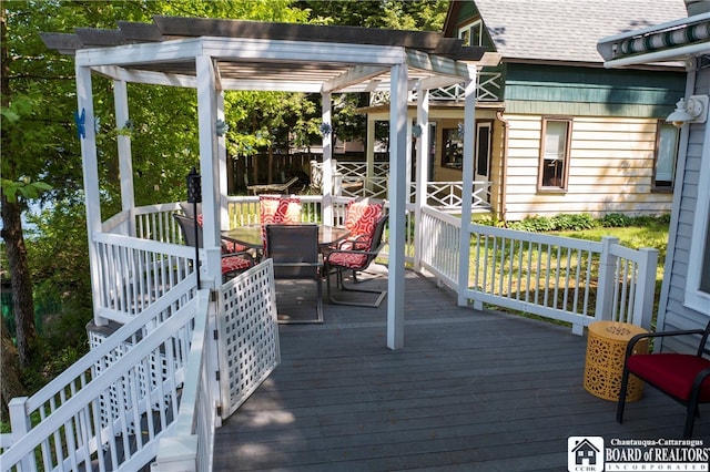 wooden deck with a pergola