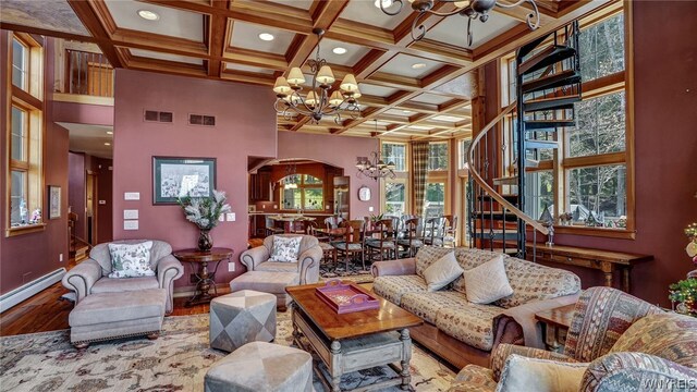 living room featuring beam ceiling, hardwood / wood-style floors, and coffered ceiling