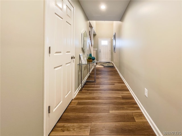 hallway featuring dark wood-type flooring