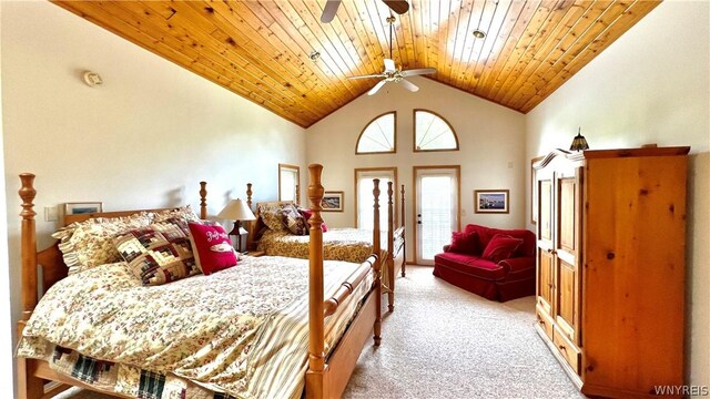 carpeted bedroom featuring high vaulted ceiling, ceiling fan, and wooden ceiling