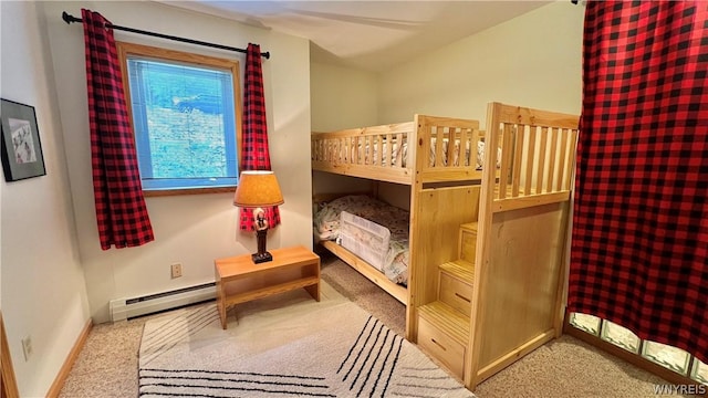 bedroom with ceiling fan, carpet floors, a baseboard radiator, and vaulted ceiling