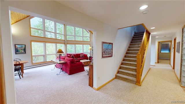 living room featuring light carpet and a healthy amount of sunlight