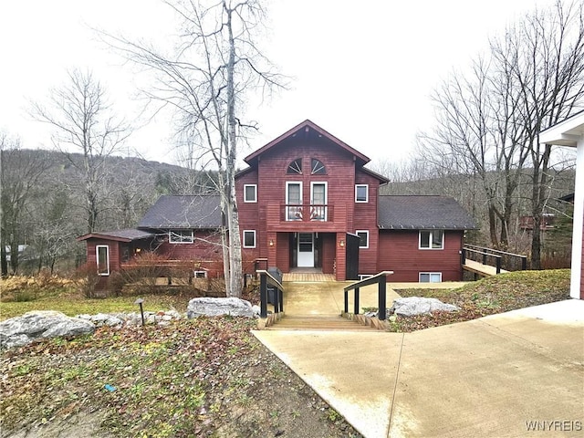 view of property with a balcony