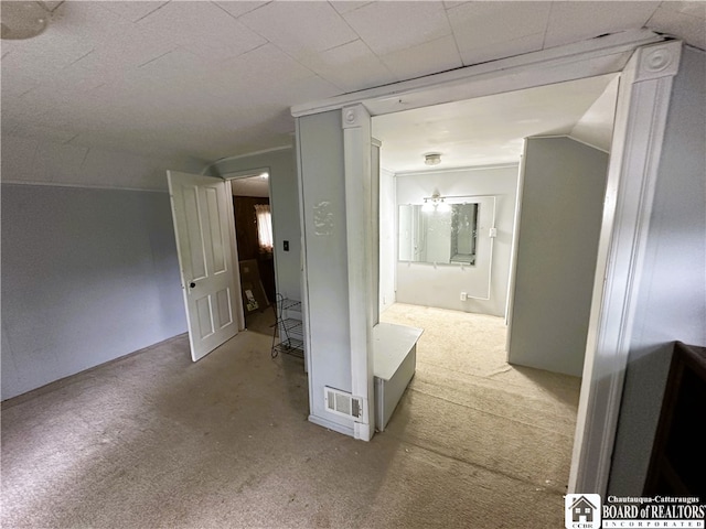 hallway featuring carpet floors