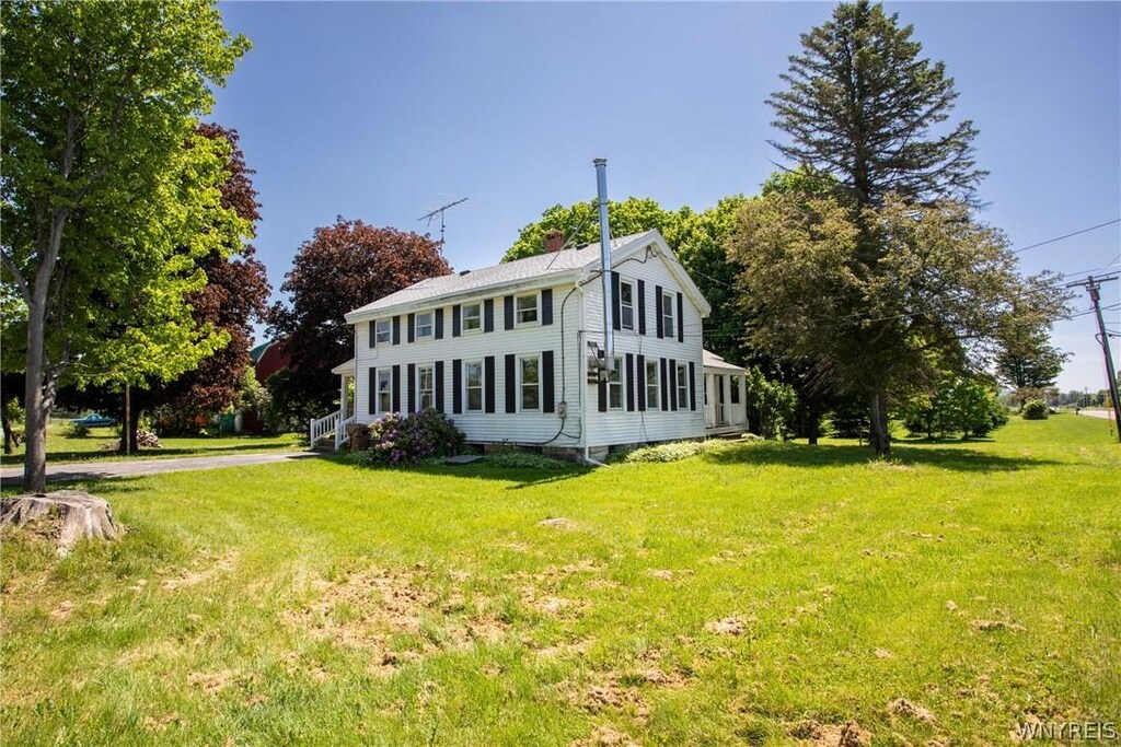 9028 Rte 16, Machias, NY 14101 - view of side of property with a yard