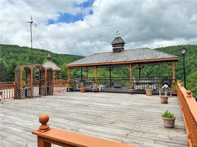 wooden deck featuring a gazebo