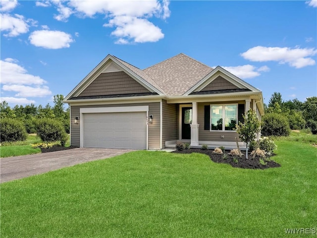 craftsman-style house with driveway, an attached garage, a front lawn, and roof with shingles