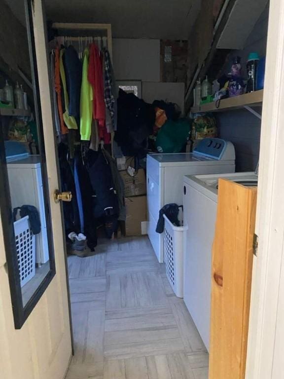 laundry room with washer and dryer