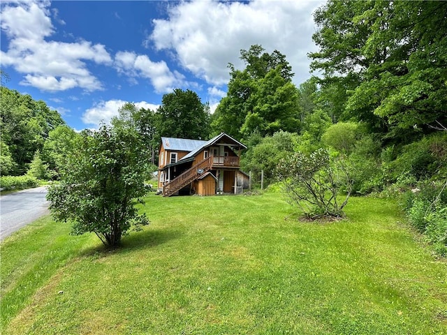 view of yard featuring a deck